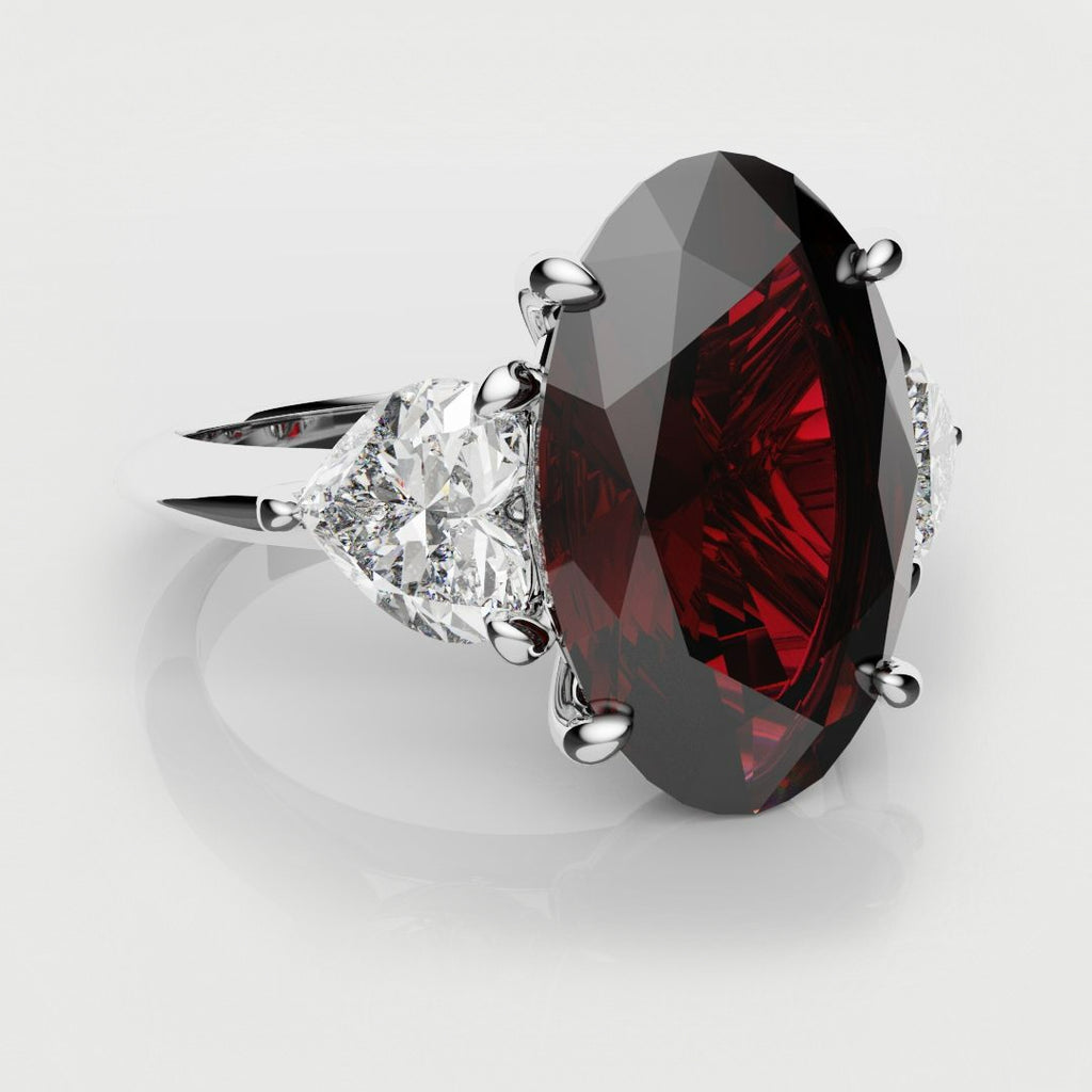 oval ruby and heart diamond trilogy engagement ring