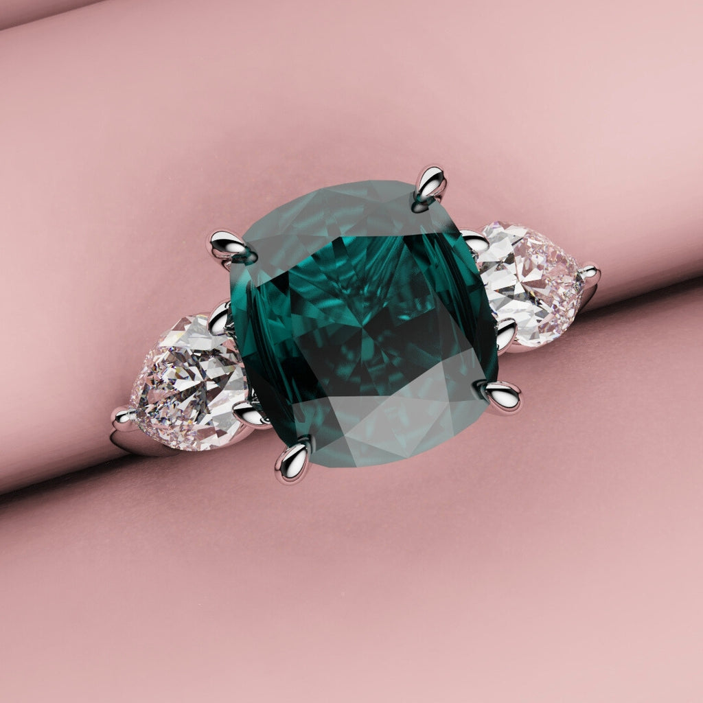 teal sapphire and diamond three stone engagement ring 