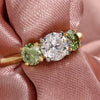 Three Stone Engagement Ring With Green Shoulder Diamonds