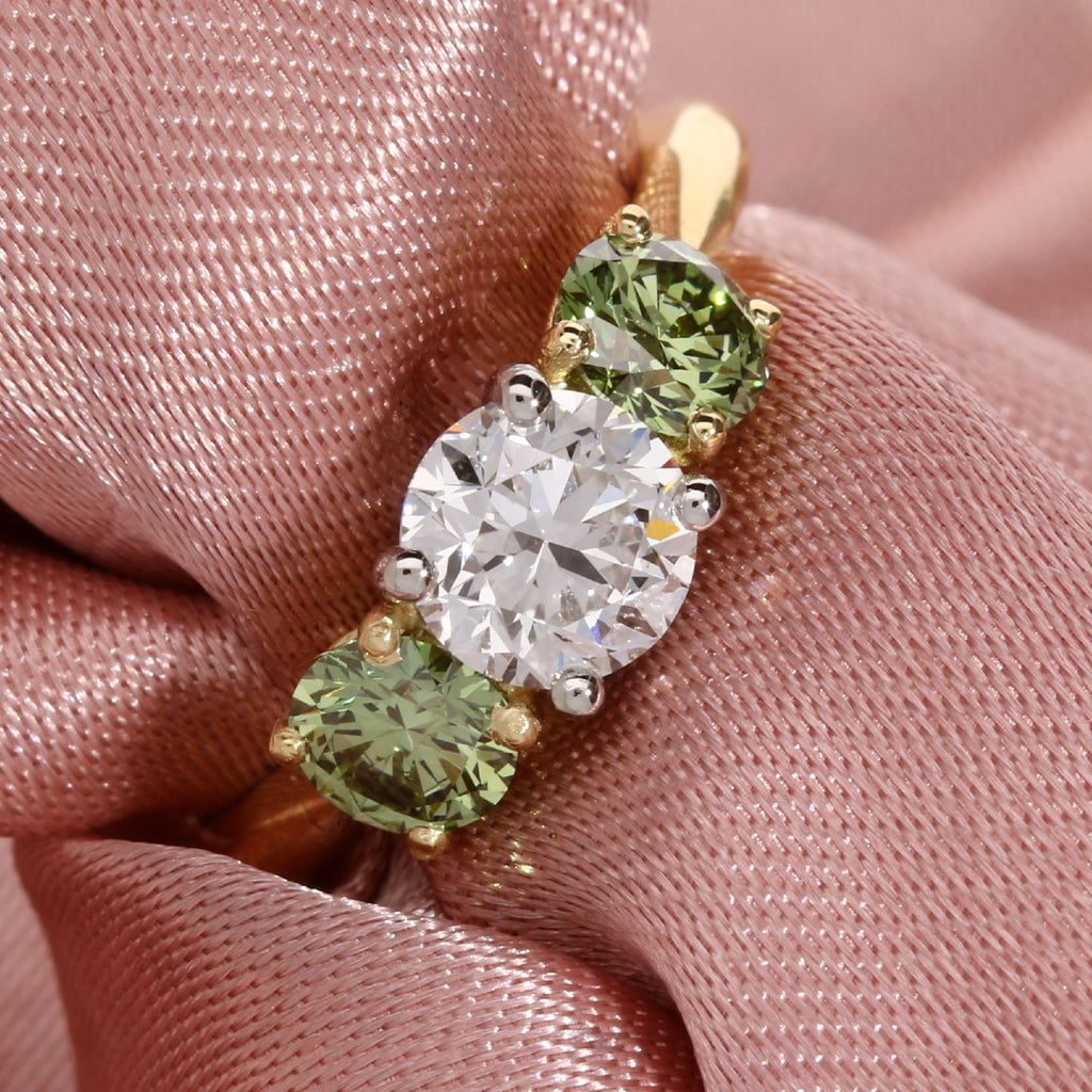 Three Stone Engagement Ring With Green Shoulder Diamonds