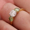 Three Stone Engagement Ring With Green Shoulder Diamonds