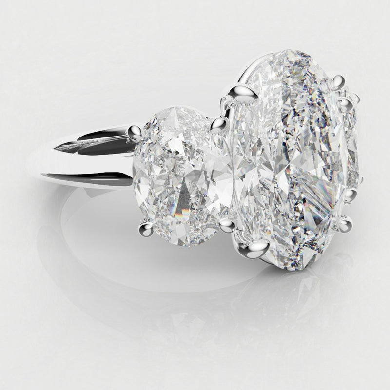 Trilogy Oval Diamond Engagement Ring