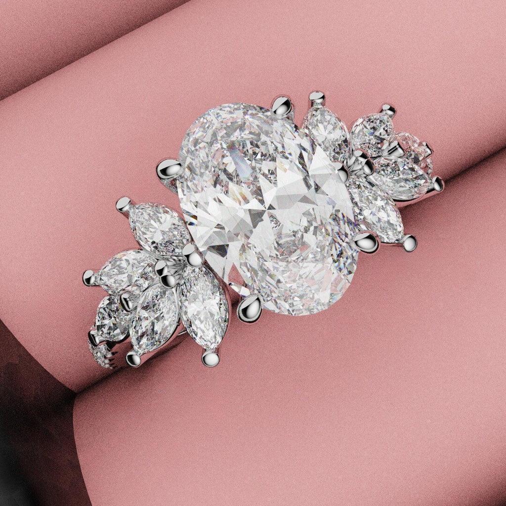 Oval Diamond Engagement Ring With Marquise Detailing