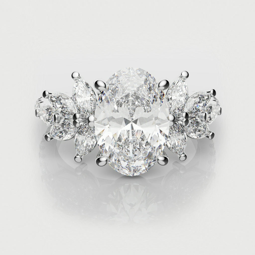 Oval Diamond Engagement Ring With Marquise Detailing