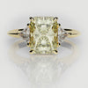 radiant cut yellow diamond three stone engagement ring