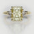 radiant cut yellow diamond three stone engagement ring