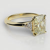 fancy yellow three stone radiant cut engagement ring