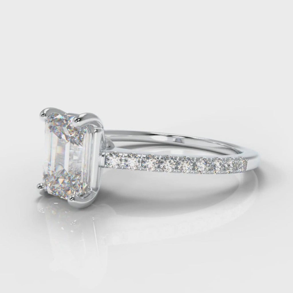 Petite emerald cut engagement ring