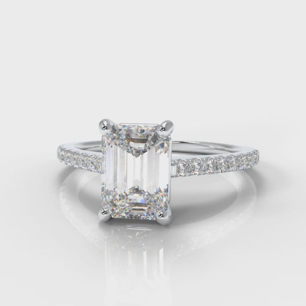 Petite emerald cut diamond engagement ring