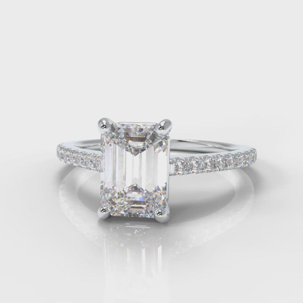 Petite emerald cut diamond engagement ring