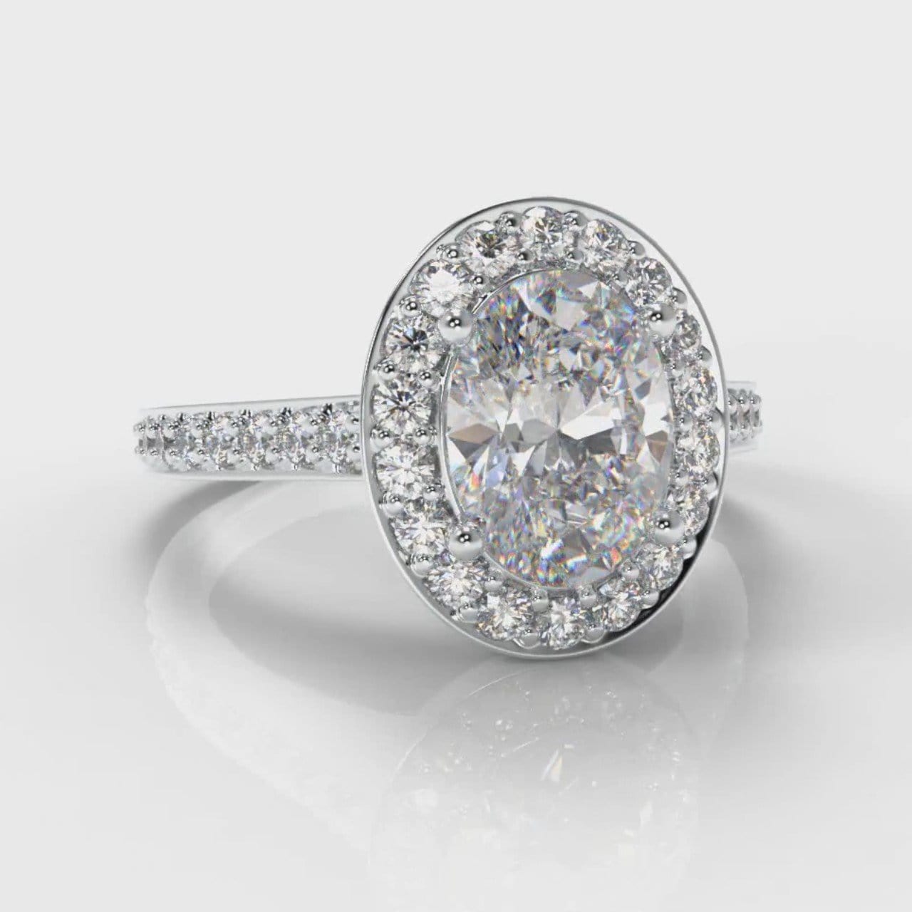Pavé Oval Diamond Halo Engagement Ring