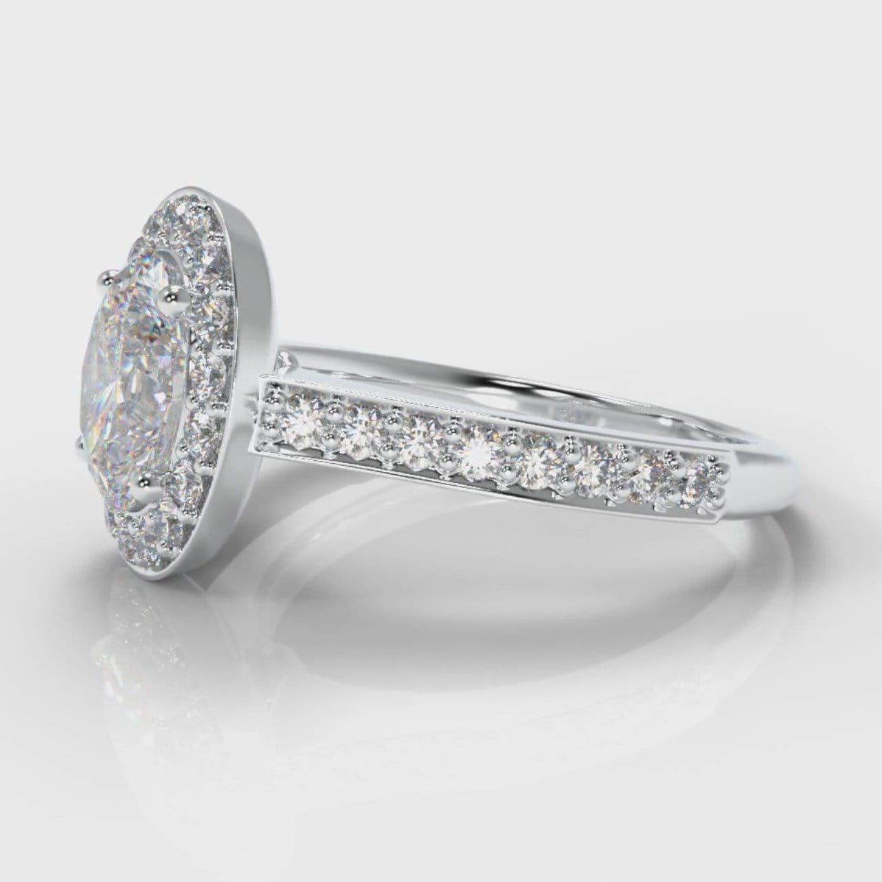 Pavé Oval Diamond Halo Engagement Ring