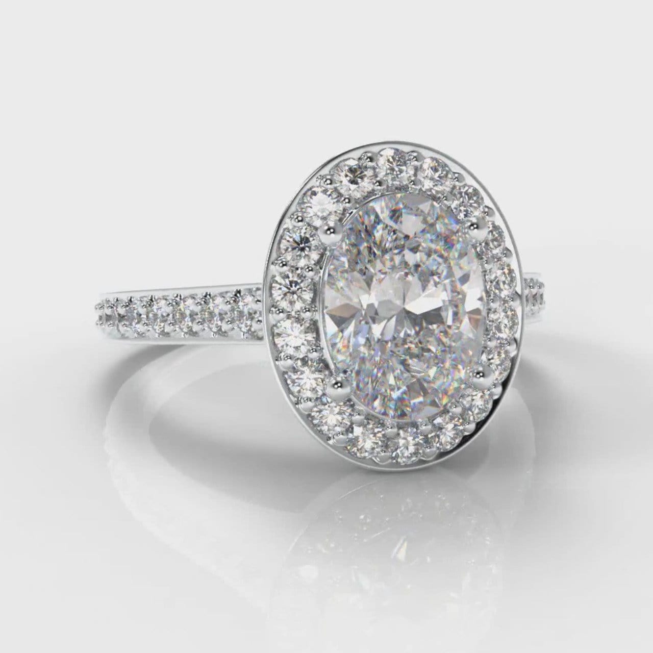 Pavé Oval Diamond Halo Engagement Ring