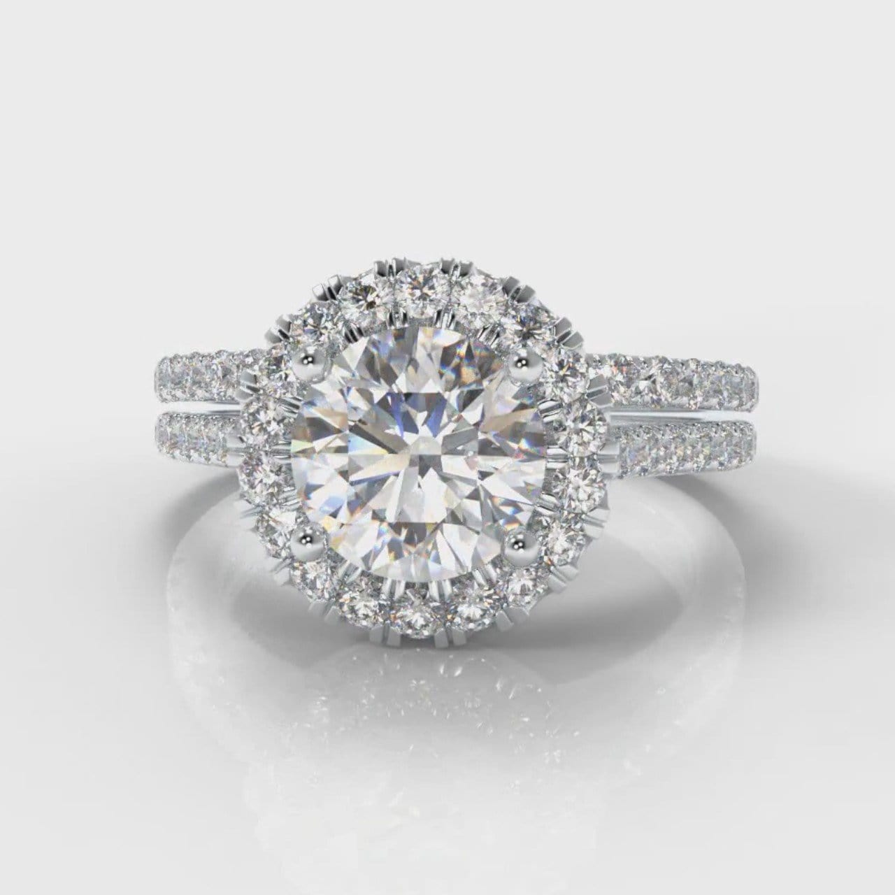 Petite Micropavé Round Brilliant Cut Diamond Halo Bridal Set