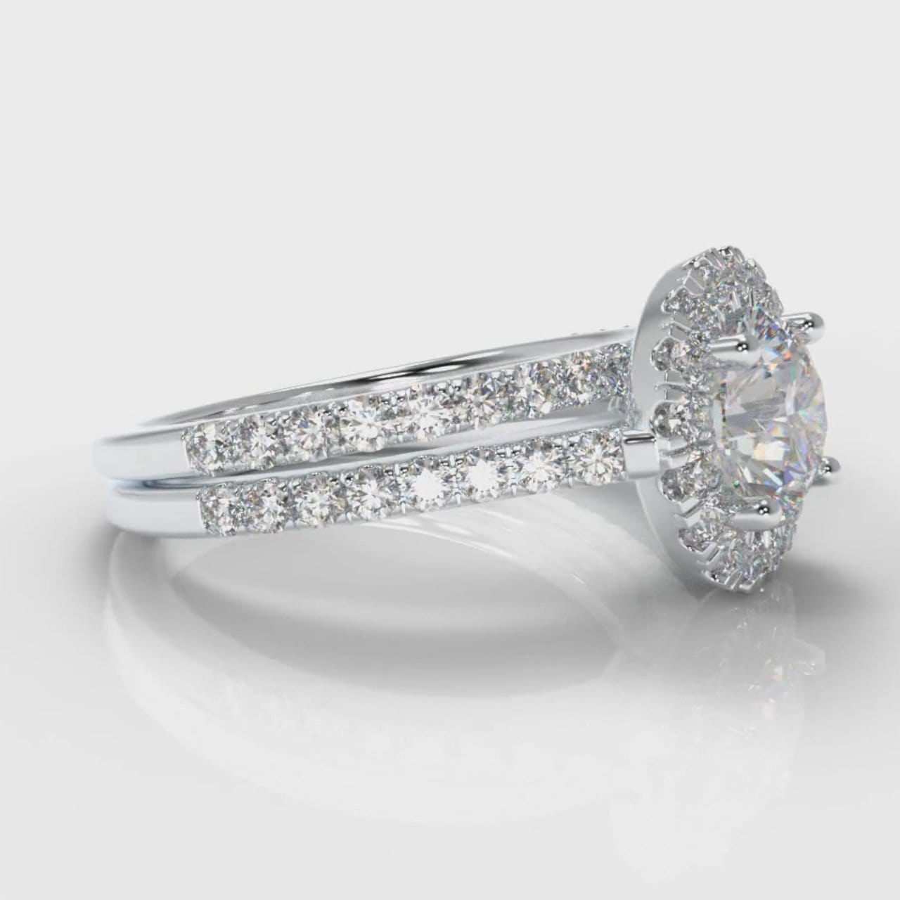 Petite Micropavé Round Brilliant Cut Diamond Halo Bridal Set