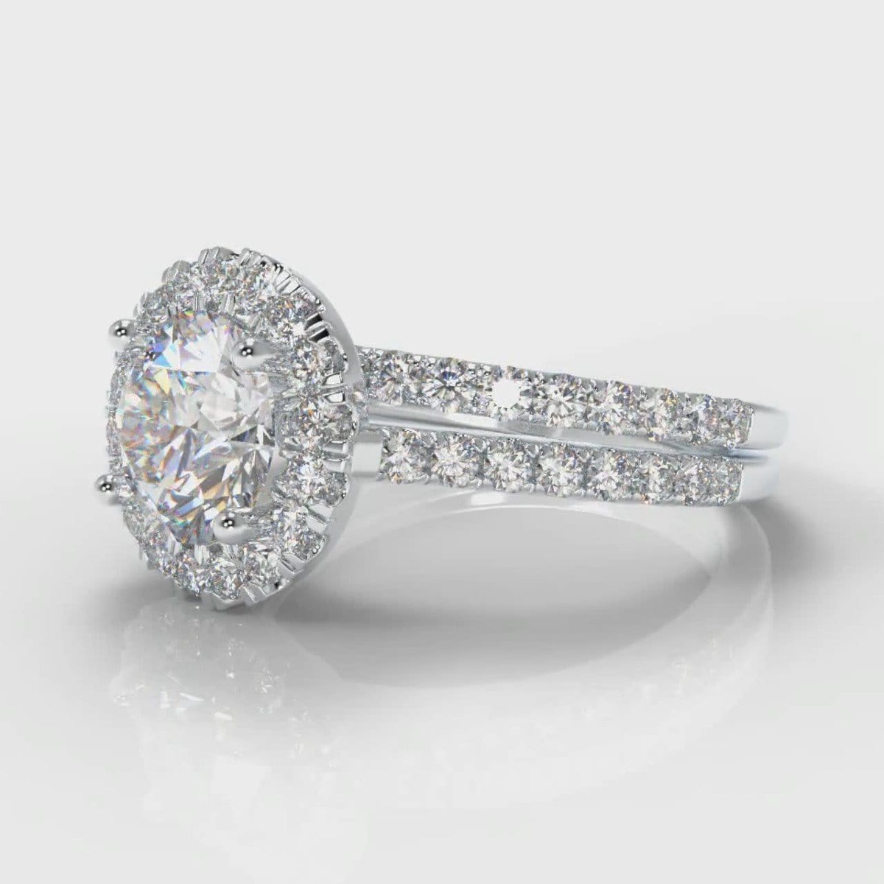 Petite Micropavé Round Brilliant Cut Diamond Halo Bridal Set