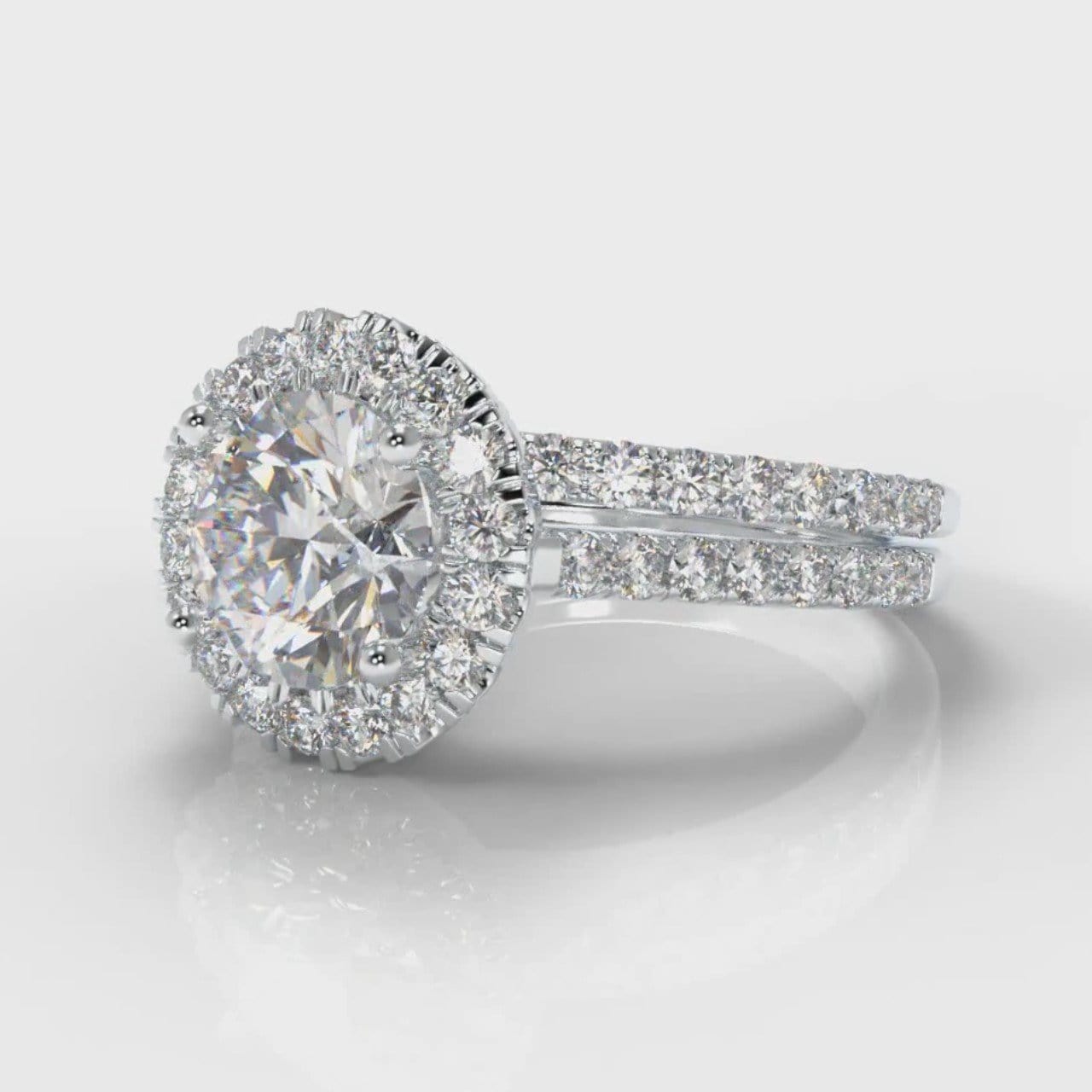 Petite Micropavé Round Brilliant Cut Diamond Halo Bridal Set