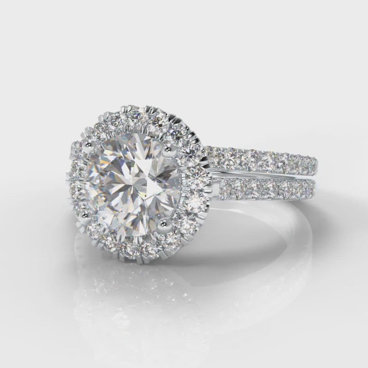 Petite Micropavé Round Brilliant Cut Diamond Halo Bridal Set
