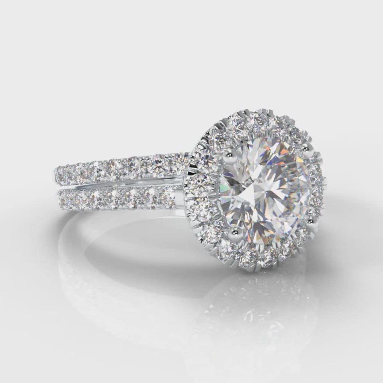 Petite Micropavé Round Brilliant Cut Diamond Halo Bridal Set
