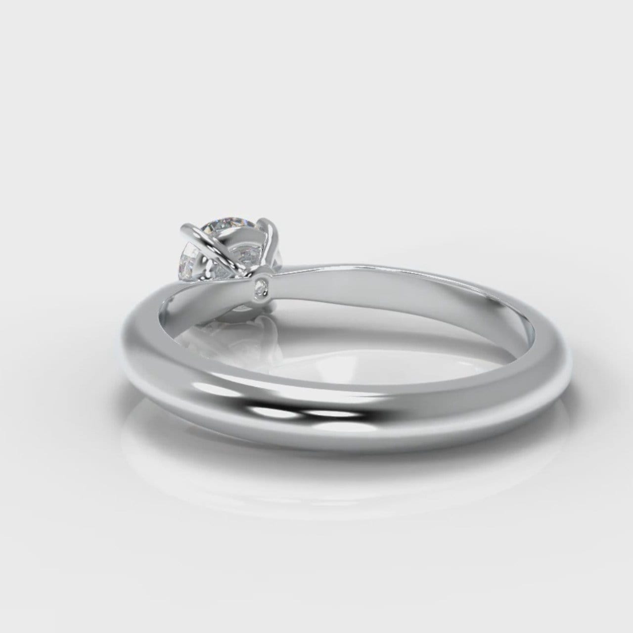 Carrée Solitaire Round Brilliant Engagement Ring