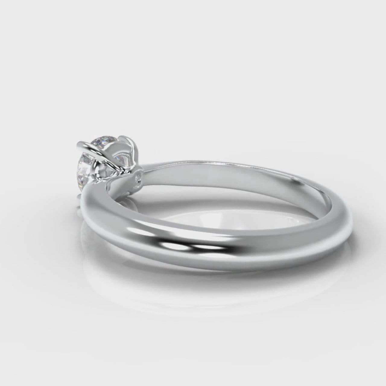 Carrée Solitaire Round Brilliant Engagement Ring