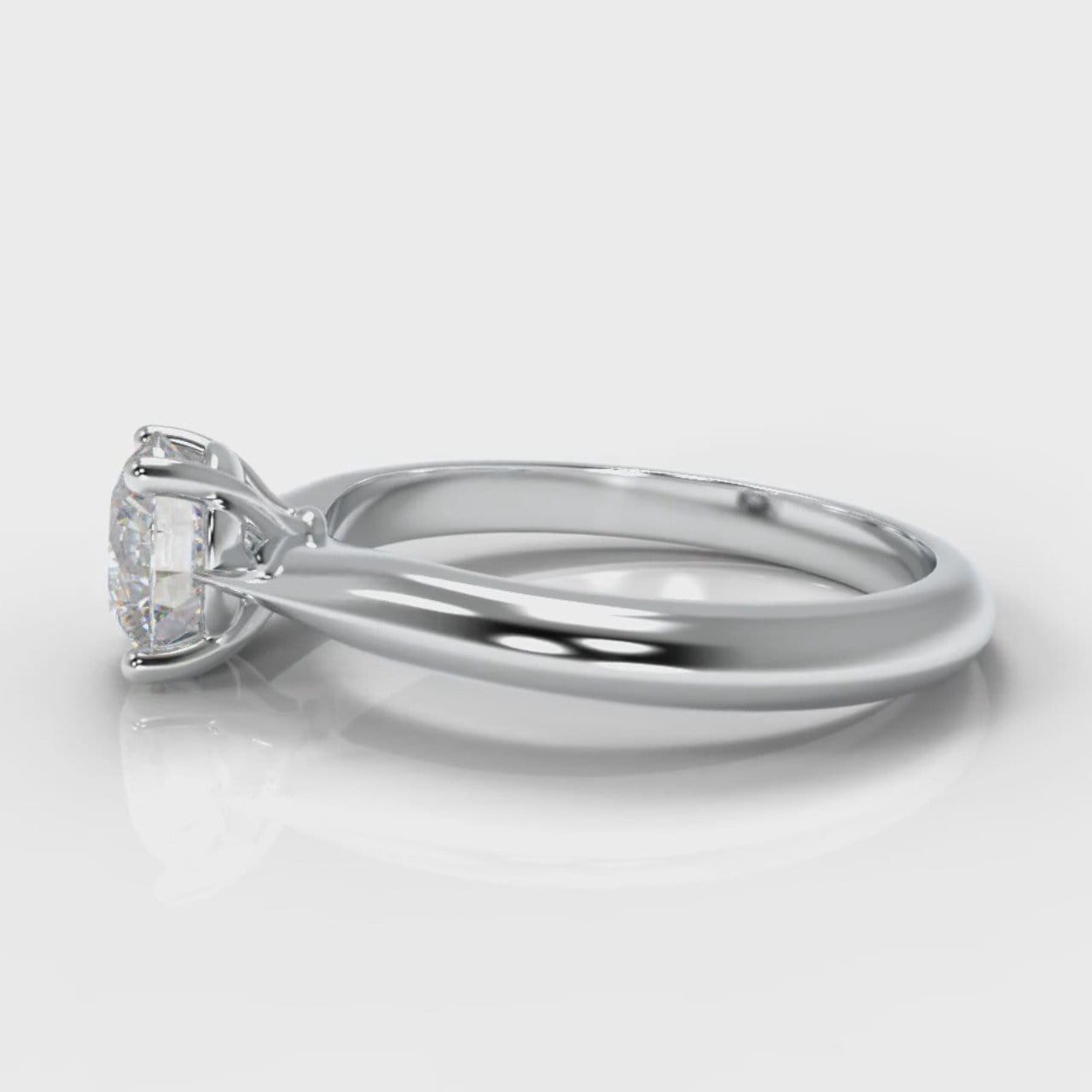 Carrée Solitaire Round Brilliant Engagement Ring
