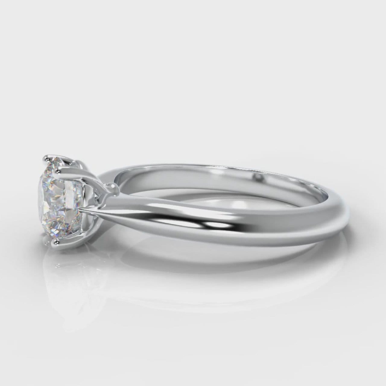 Carrée Solitaire Round Brilliant Engagement Ring