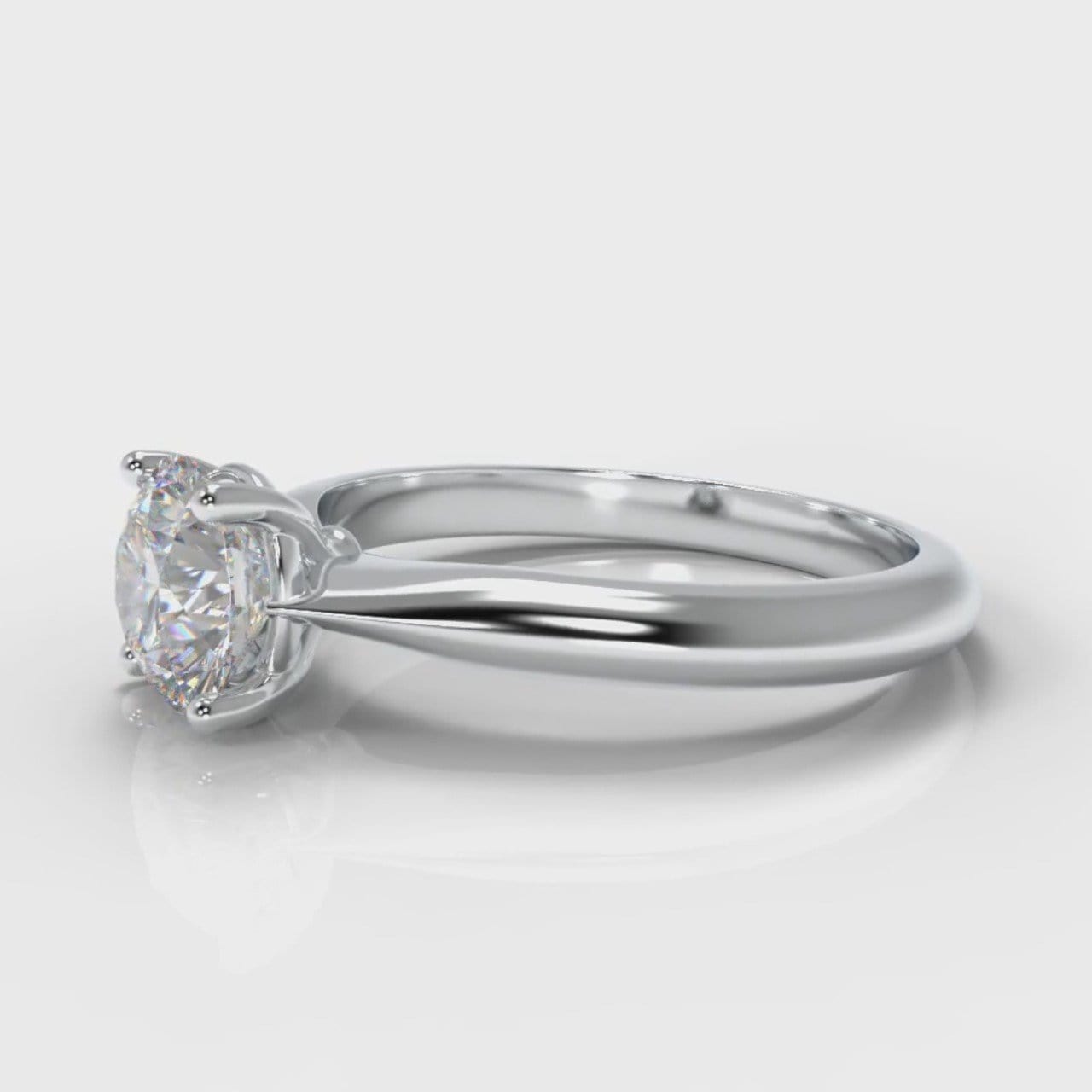 Carrée Solitaire Round Brilliant Engagement Ring
