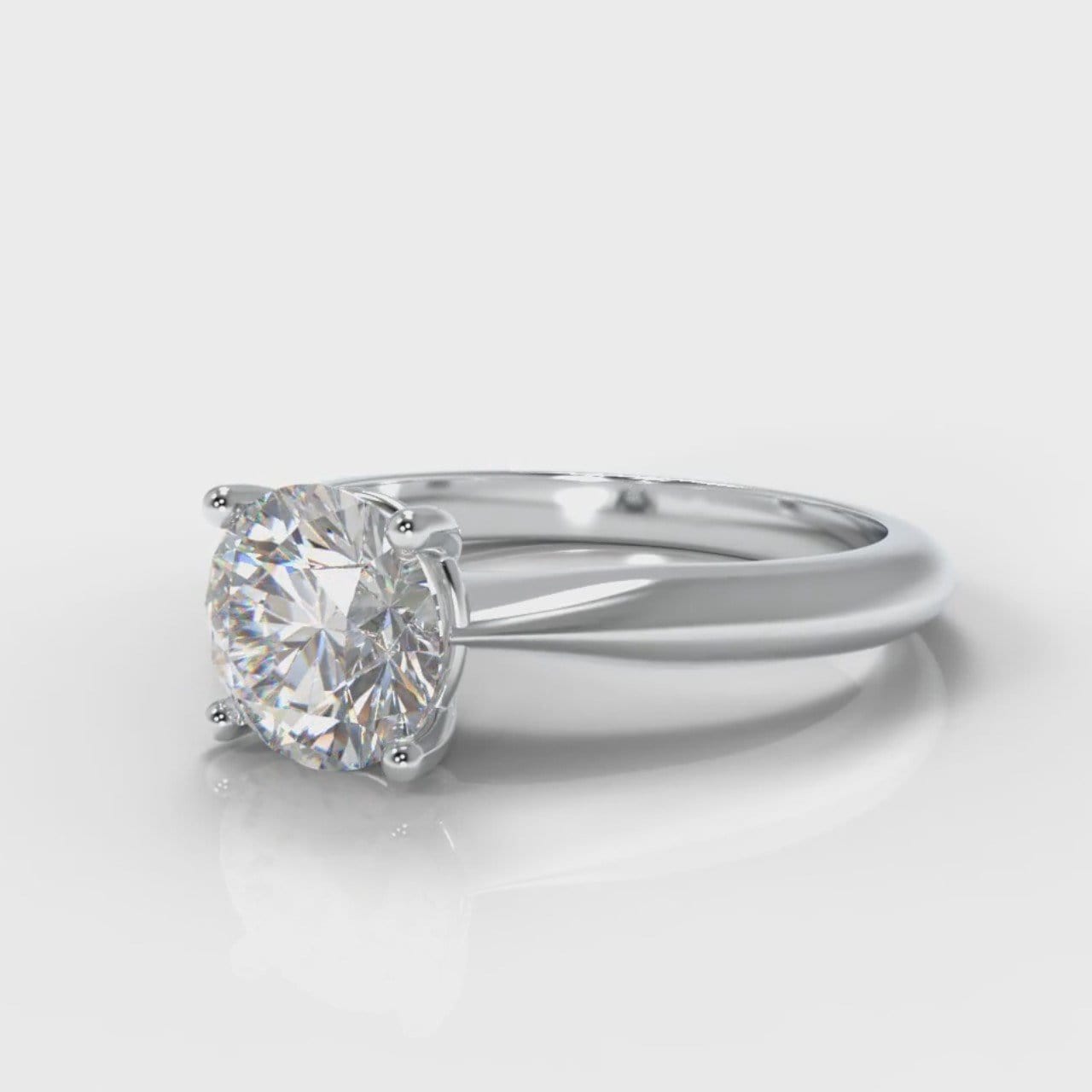 Carrée Solitaire Round Brilliant Engagement Ring