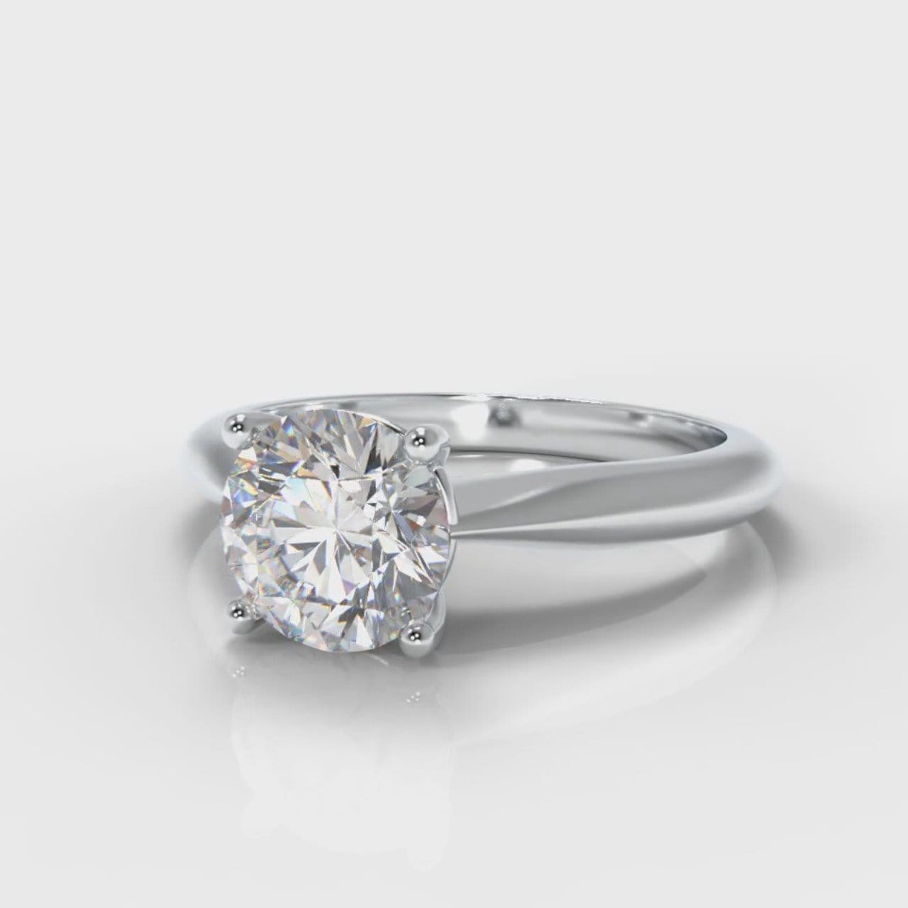 Carrée Solitaire Round Brilliant Engagement Ring