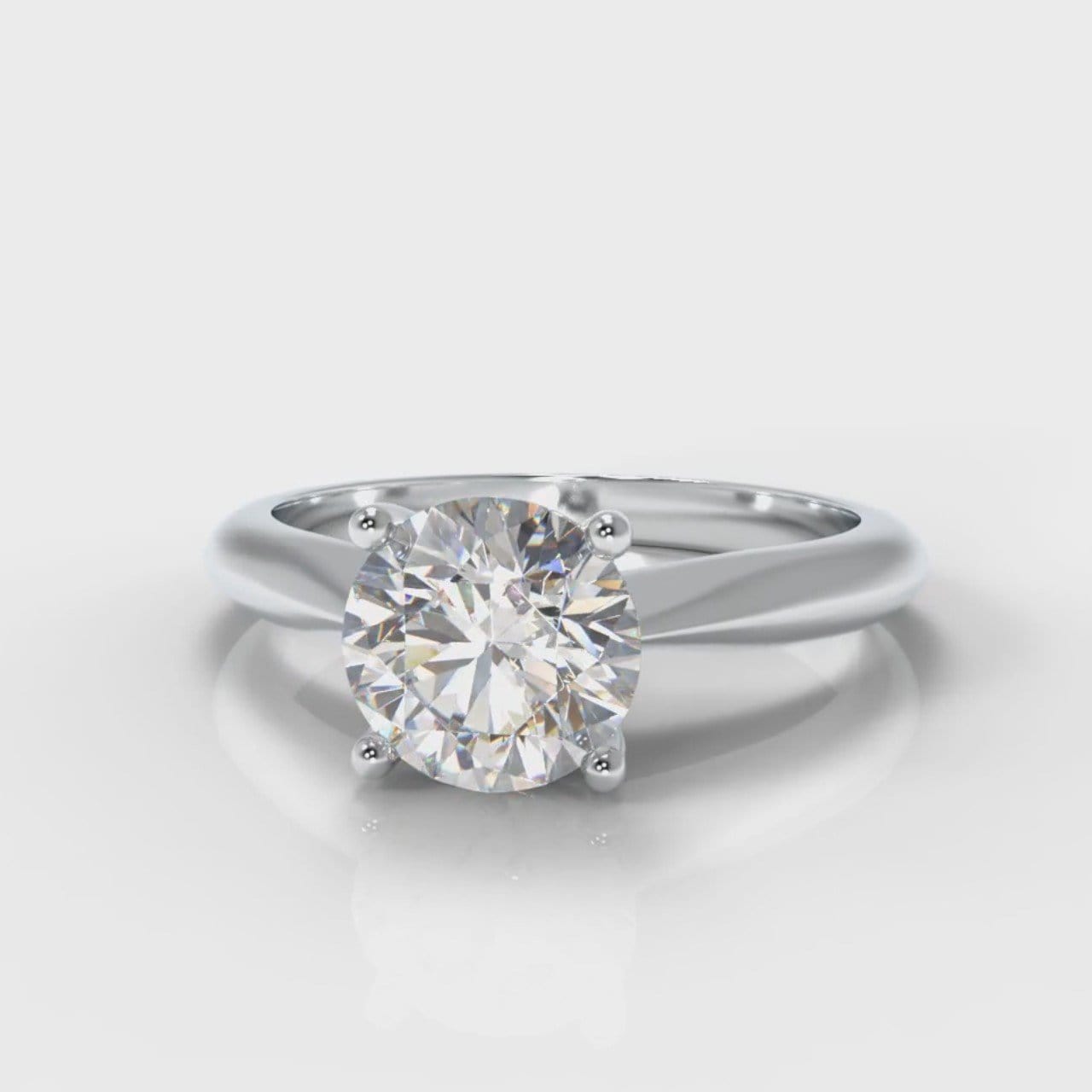 Carrée Solitaire Round Brilliant Engagement Ring