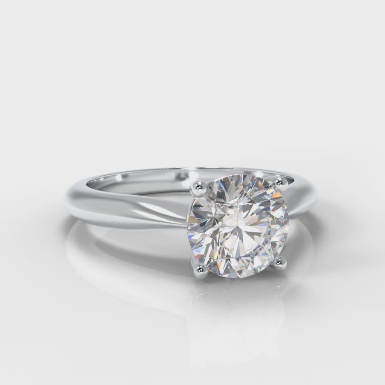 Carrée Solitaire Round Brilliant Engagement Ring