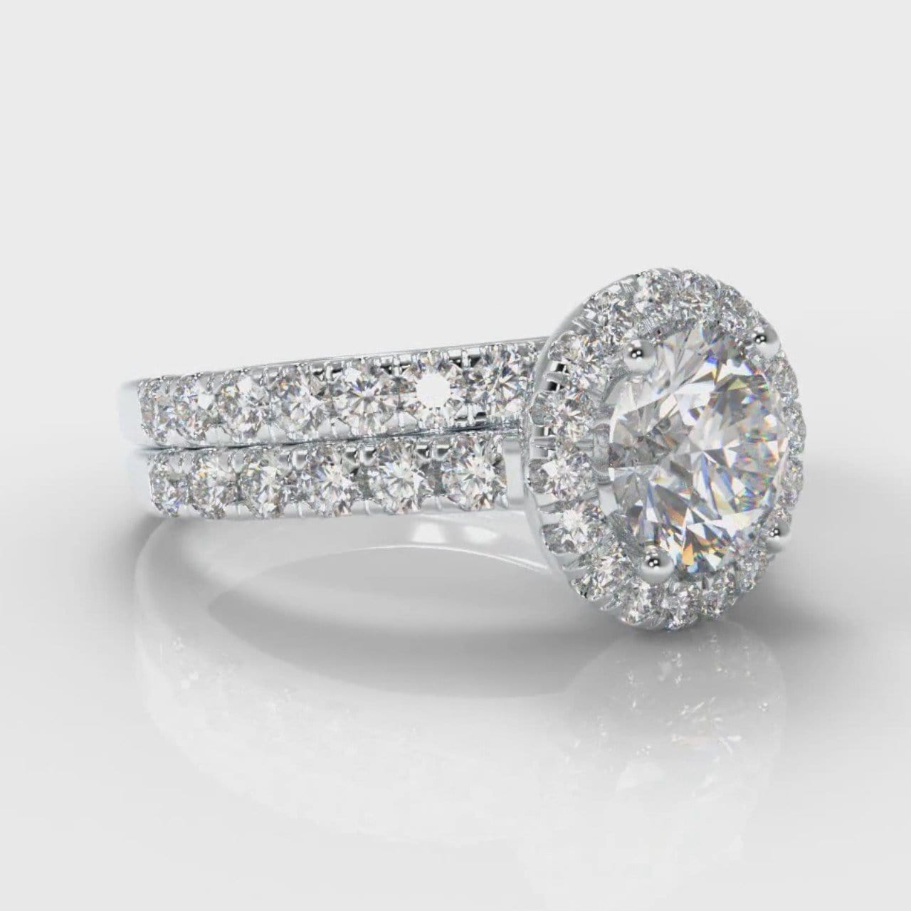 Micropavé Round Brilliant Cut Diamond Halo Bridal Set