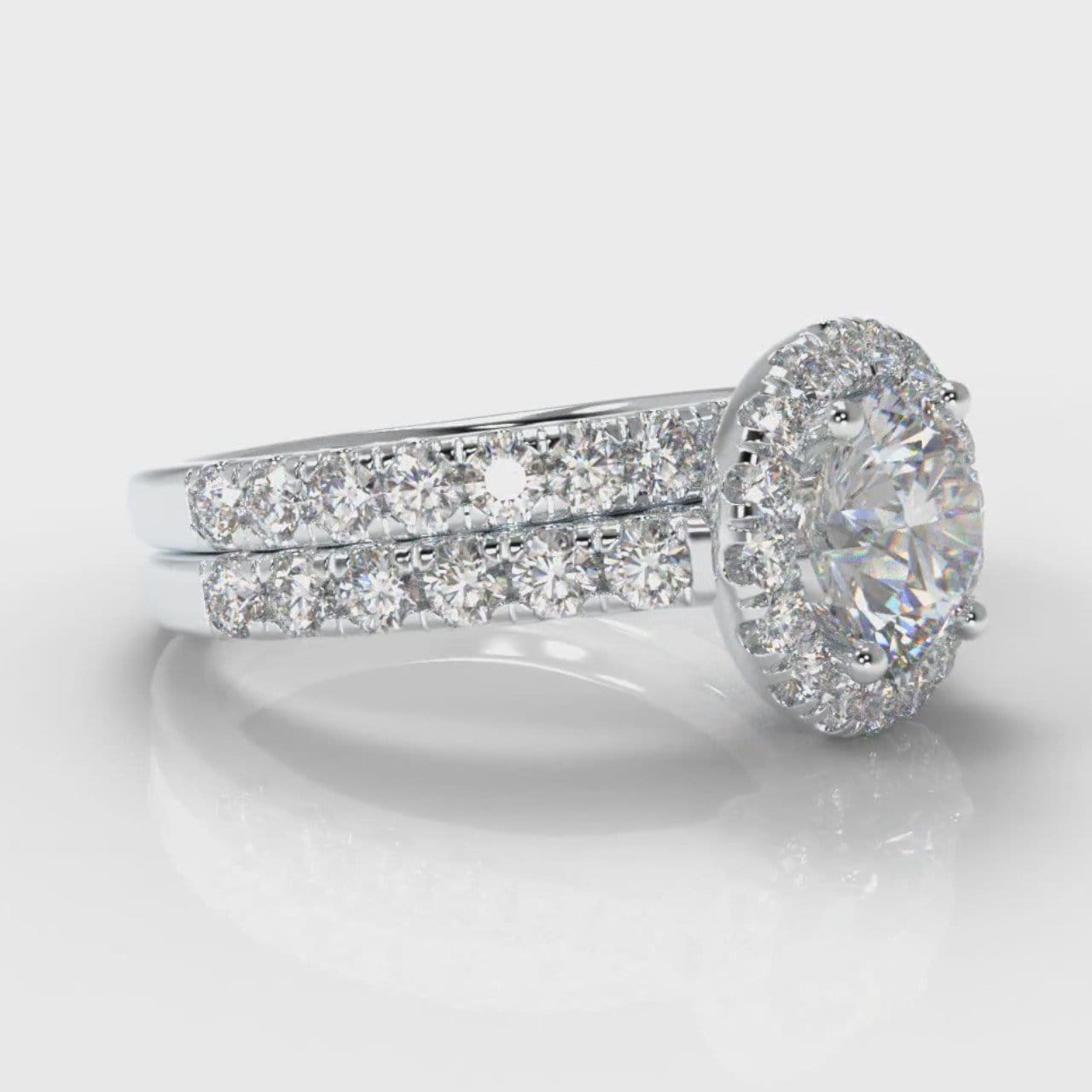 Micropavé Round Brilliant Cut Diamond Halo Bridal Set