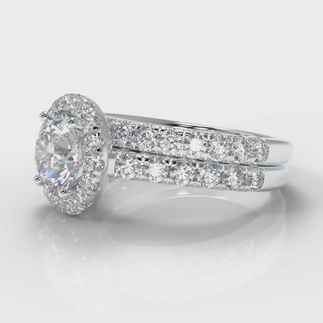 Micropavé Round Brilliant Cut Diamond Halo Bridal Set