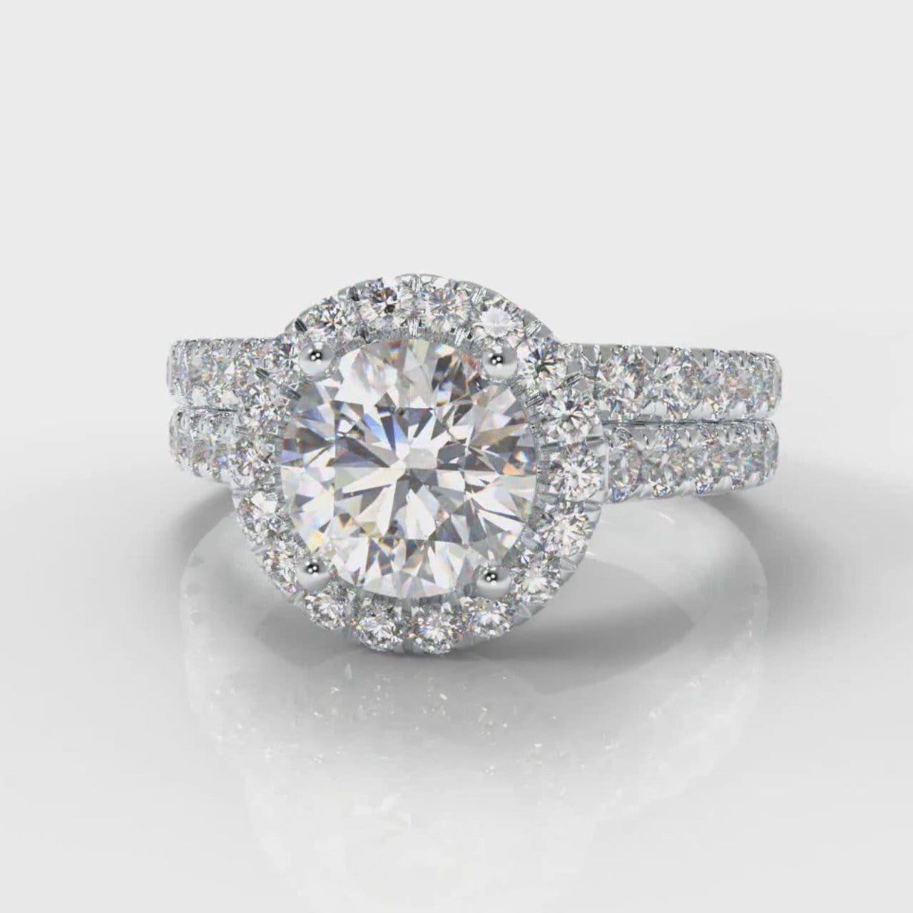 Micropavé Round Brilliant Cut Diamond Halo Bridal Set
