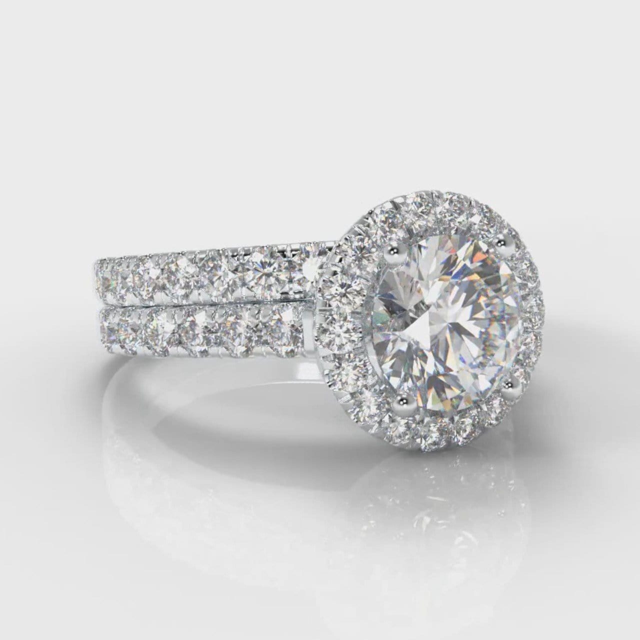 Micropavé Round Brilliant Cut Diamond Halo Bridal Set