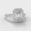Emerald cut diamond engagement ring set with a diamond halo