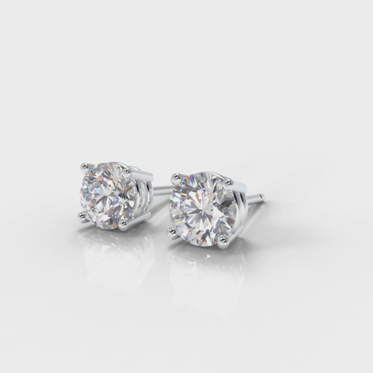 Four Claw Diamond Stud Earrings (GIA Certified)