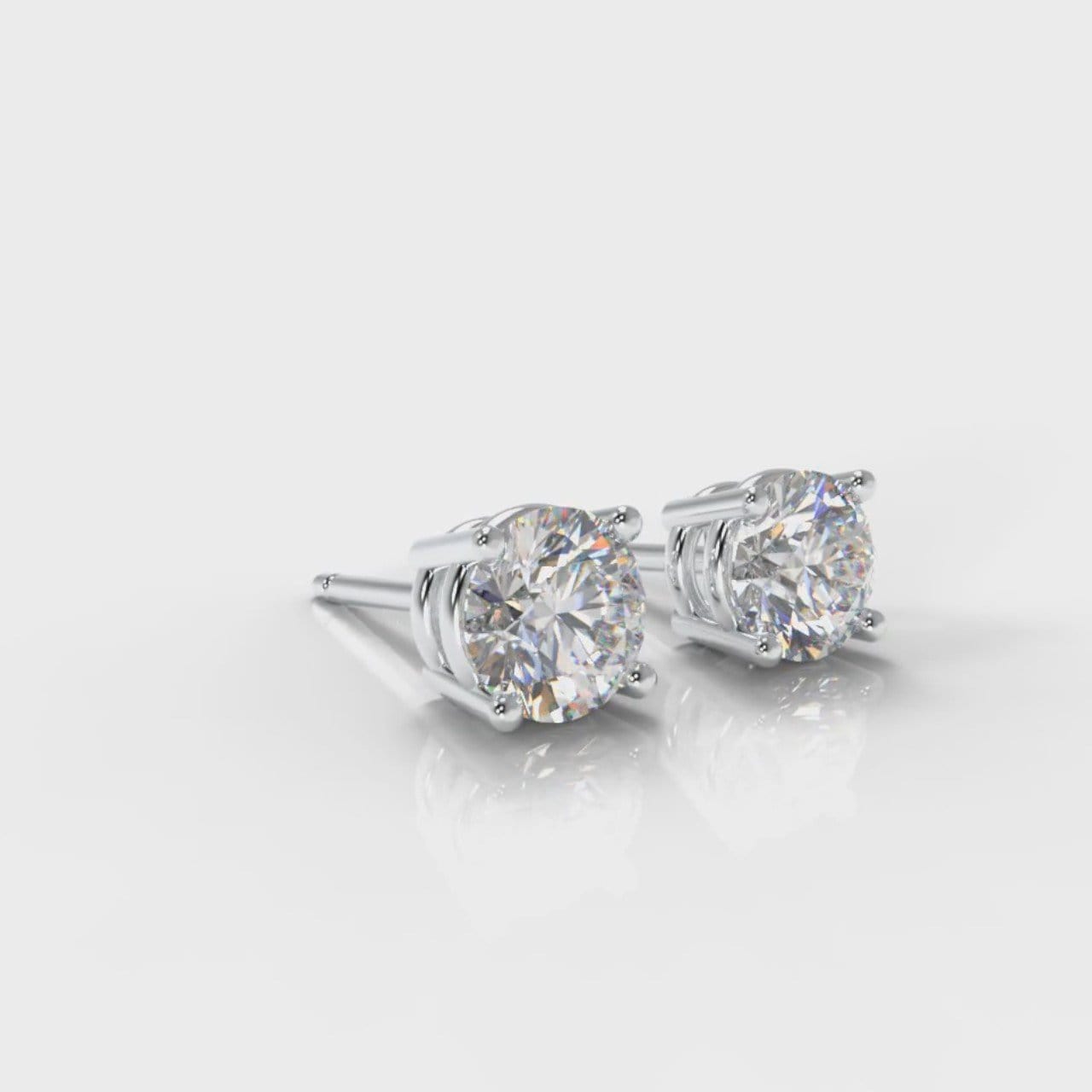 Four Claw Diamond Stud Earrings (GIA Certified)