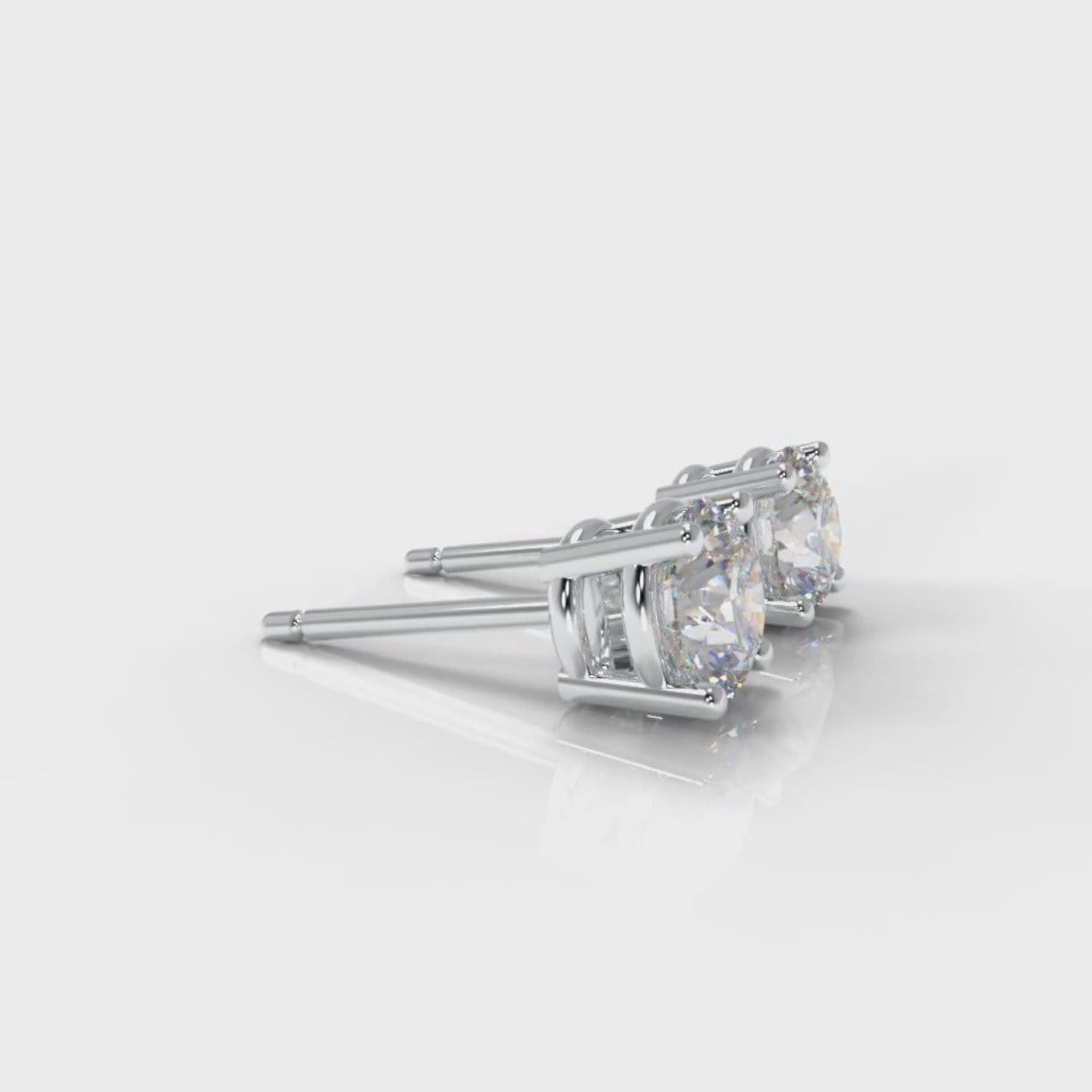 Four Claw Diamond Stud Earrings (GIA Certified)