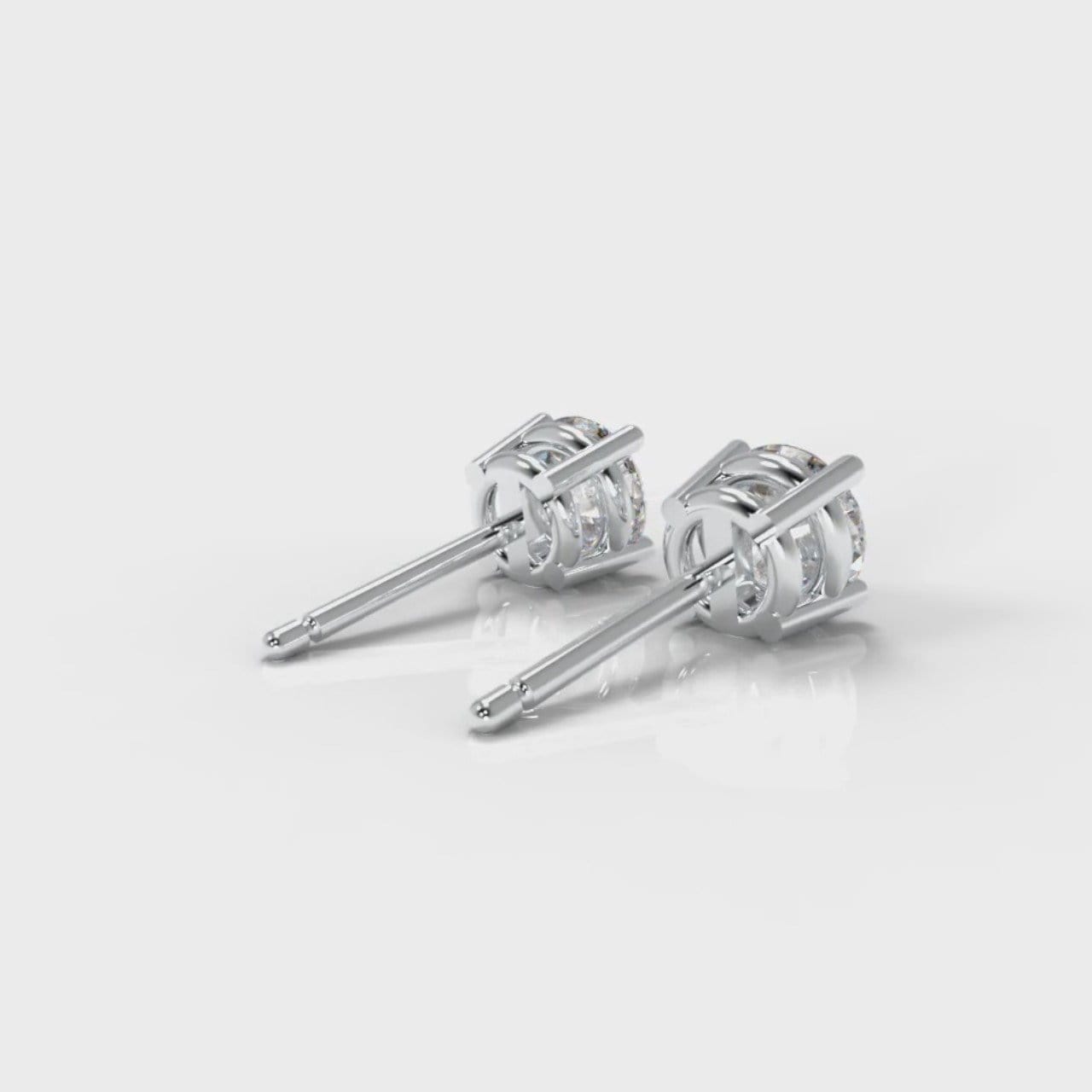 Four Claw Diamond Stud Earrings (GIA Certified)