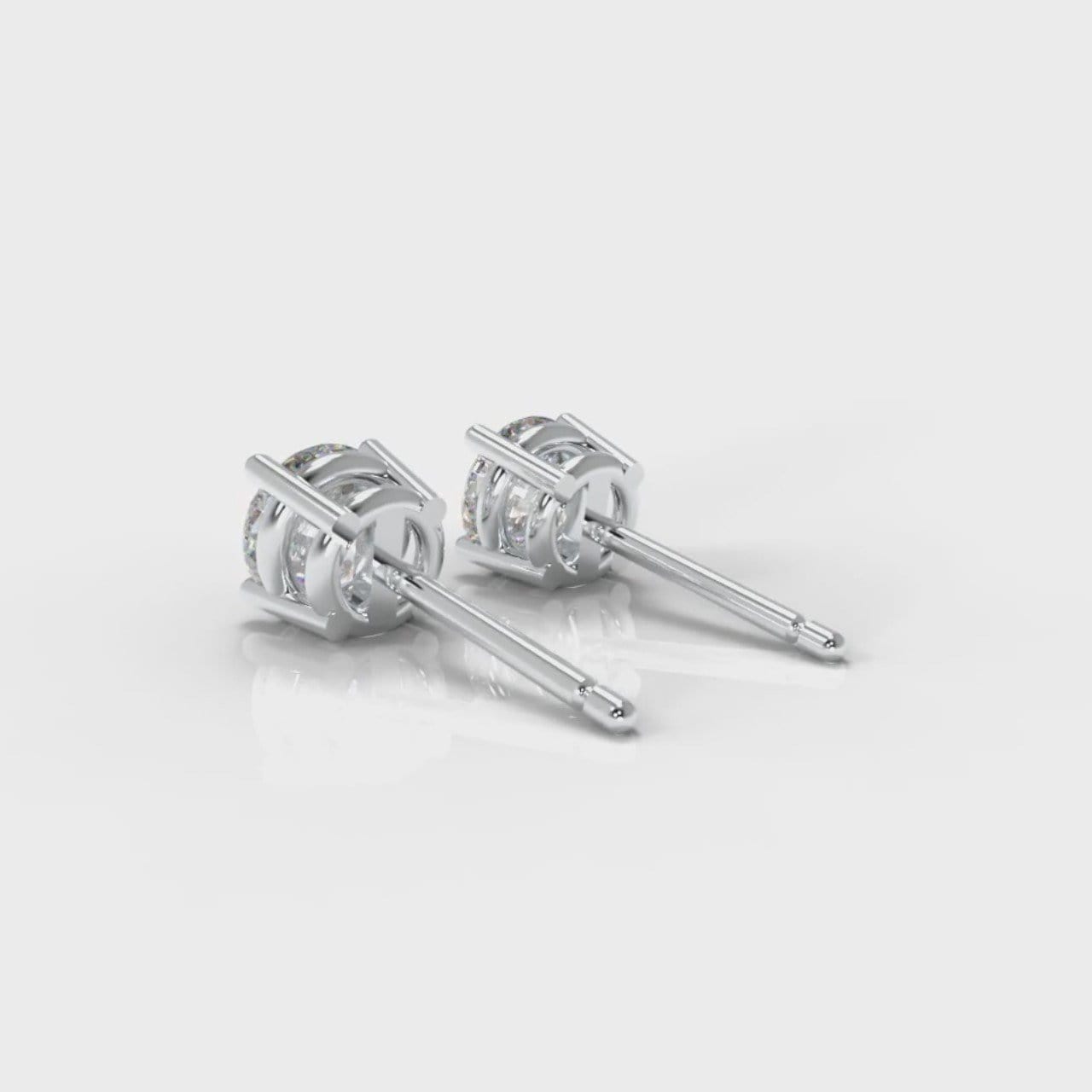 Four Claw Diamond Stud Earrings (GIA Certified)