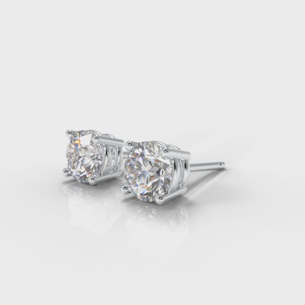 Four Claw Diamond Stud Earrings (GIA Certified)