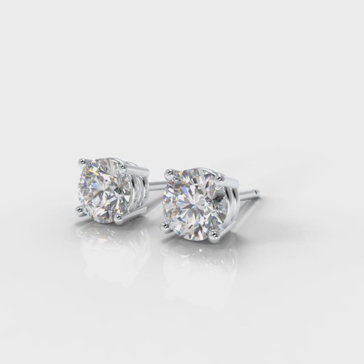 Four Claw Diamond Stud Earrings (GIA Certified)