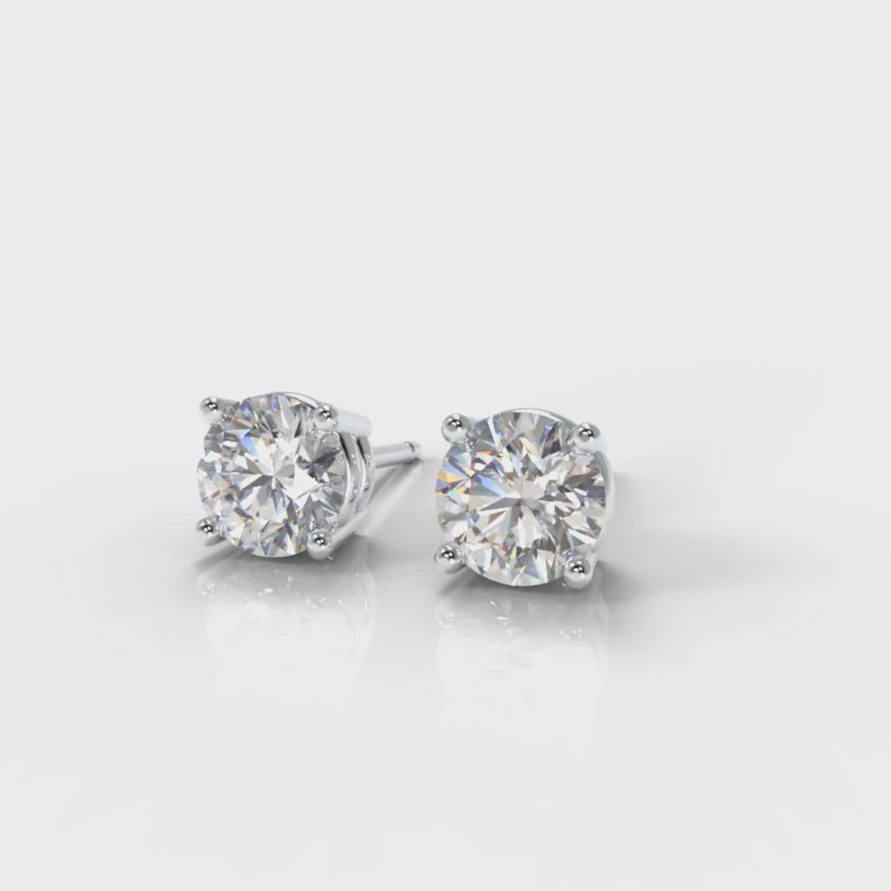 Four Claw Diamond Stud Earrings (GIA Certified)