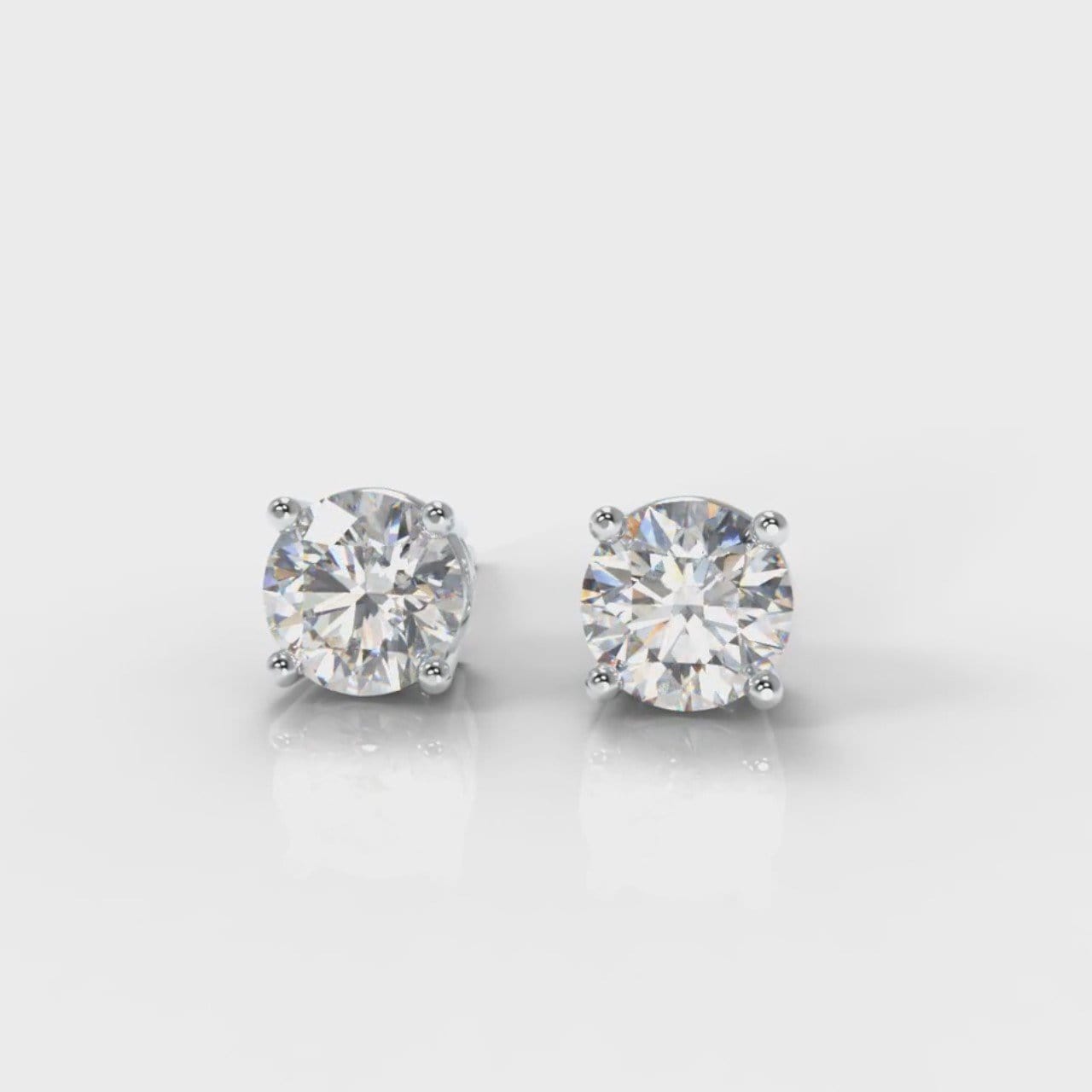 Four Claw Diamond Stud Earrings (GIA Certified)