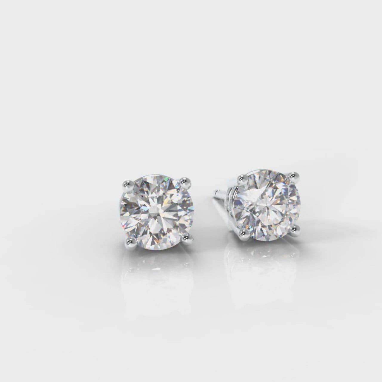 Four Claw Diamond Stud Earrings (GIA Certified)